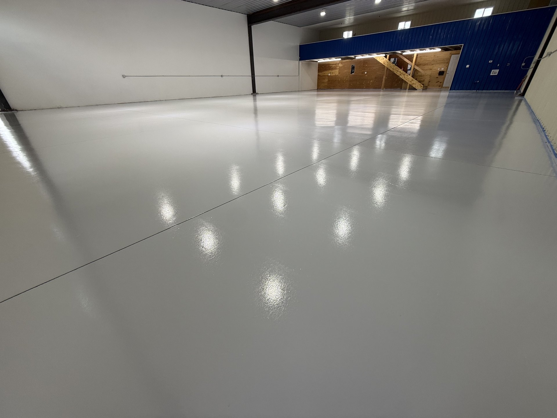 Freshly Completed Solid Color Epoxy Hangar Floor, Alaska